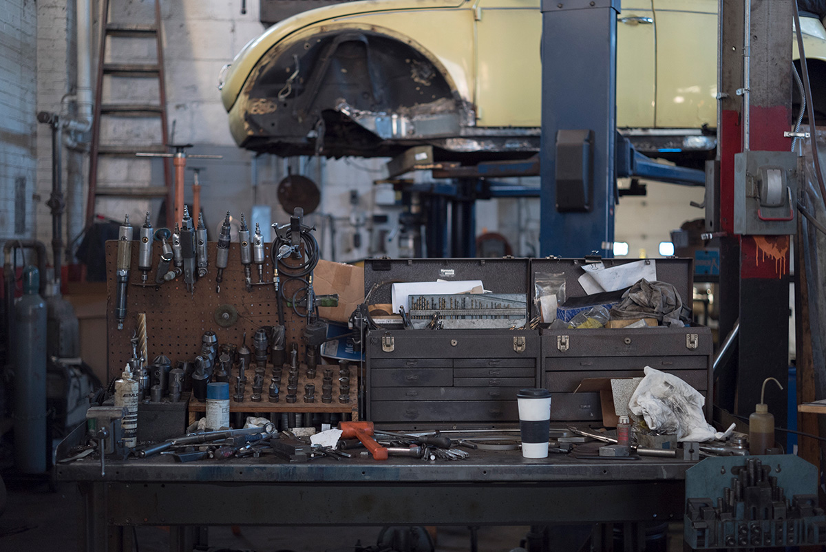 workbench of tools in an auto body shop