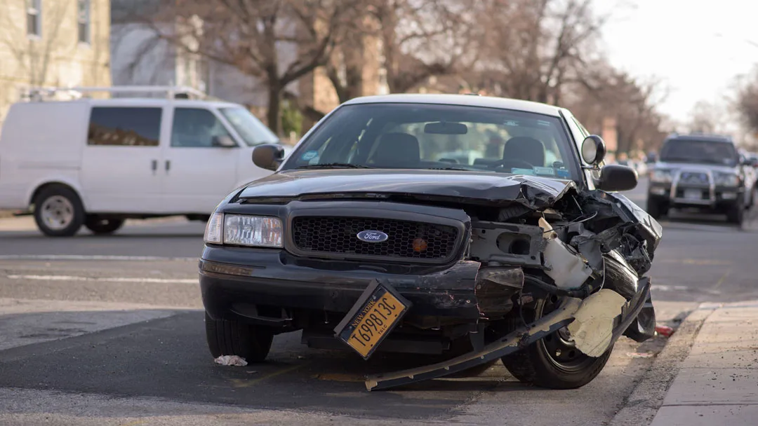 Damaged black car