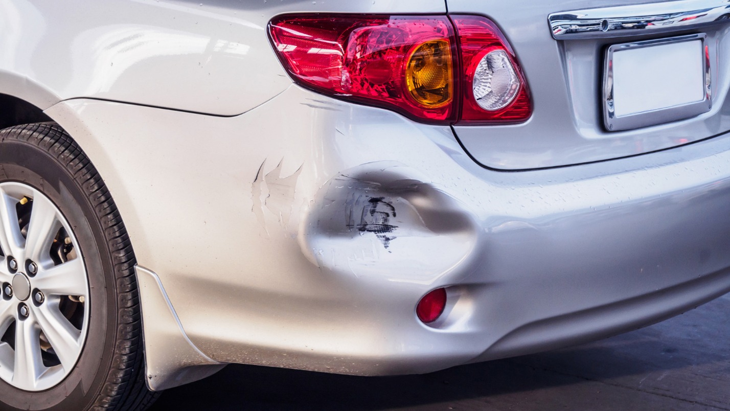 A close up image of a silver car